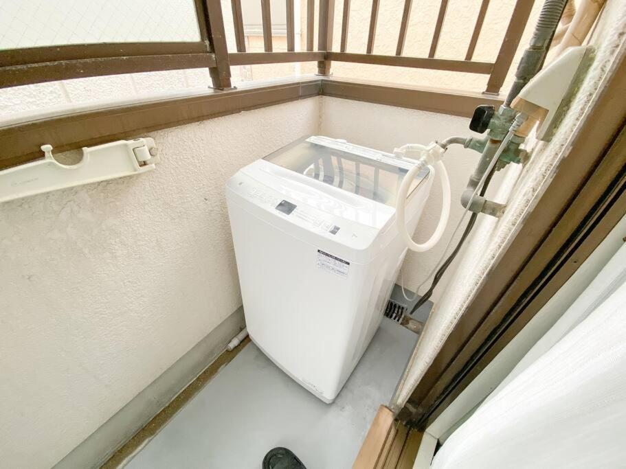 C2 Guest House ユニオン新大阪 リーズナブルで長期滞在に最適 Bagian luar foto