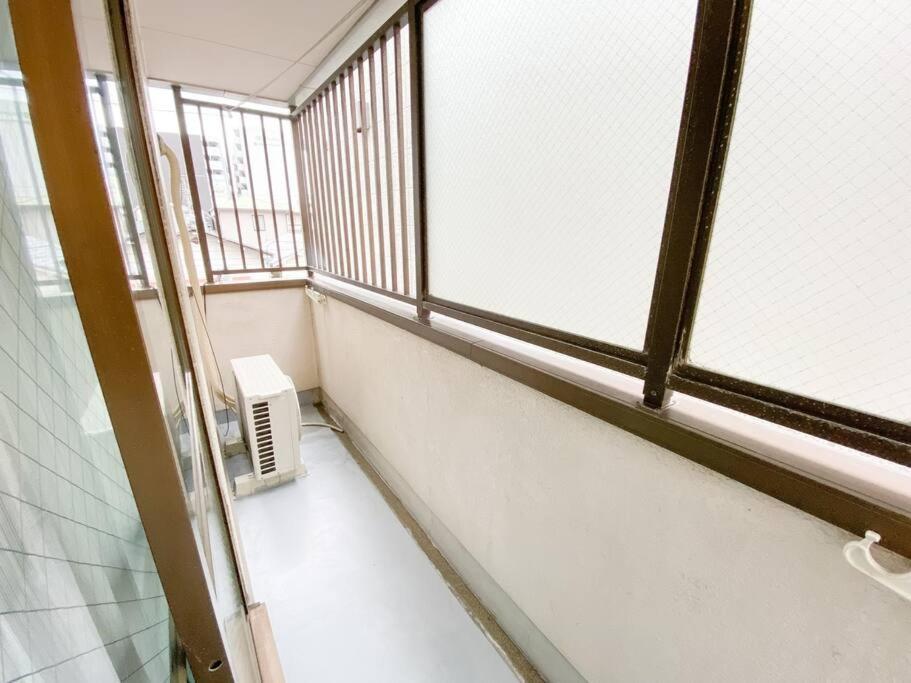 C2 Guest House ユニオン新大阪 リーズナブルで長期滞在に最適 Bagian luar foto
